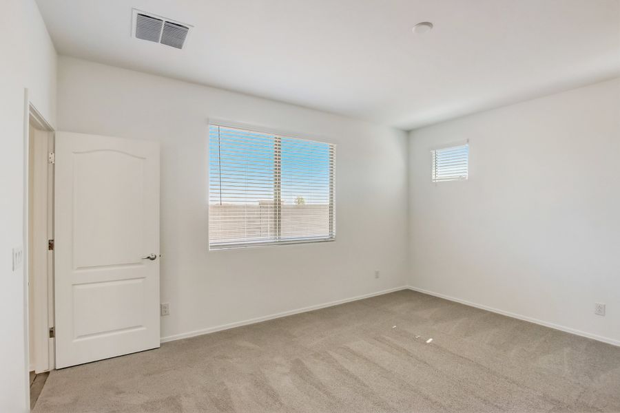 Representative unfurnished interior of a home built from the Larkspur by DRB Homes in The Villas at Mystic, Peoria (Image 12).
