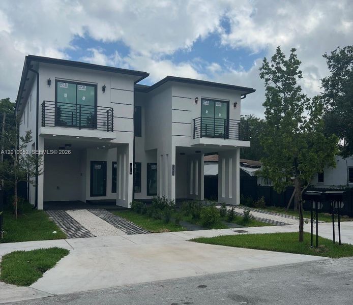 Front exterior of a new home in , Miami, FL, highlighting curb appeal (Image 25).