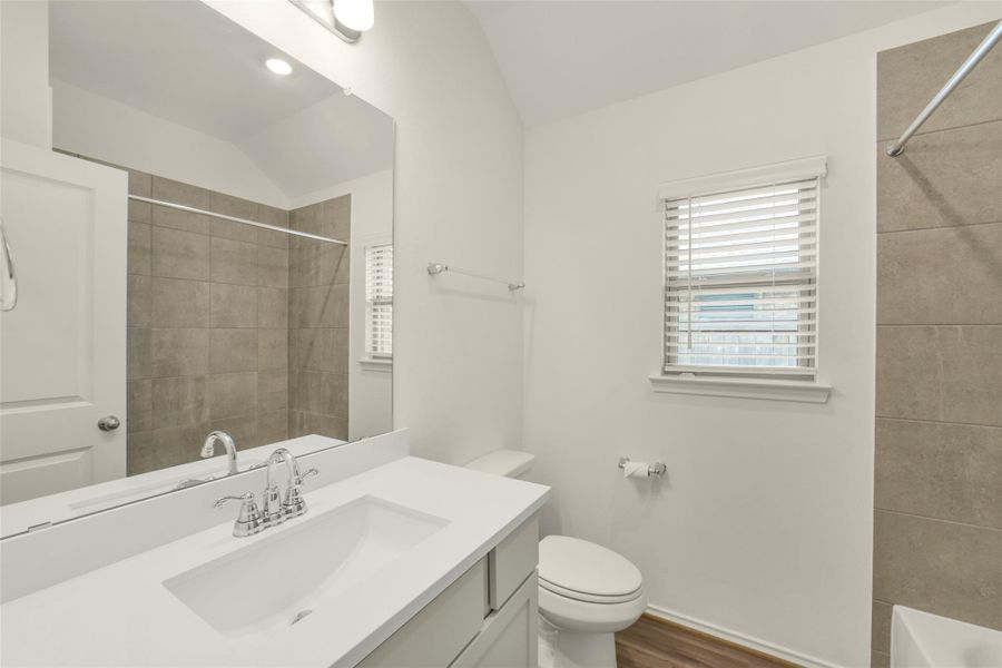 Furnished interior view inside a new home in Bridgeland, Cypress (Image 15).