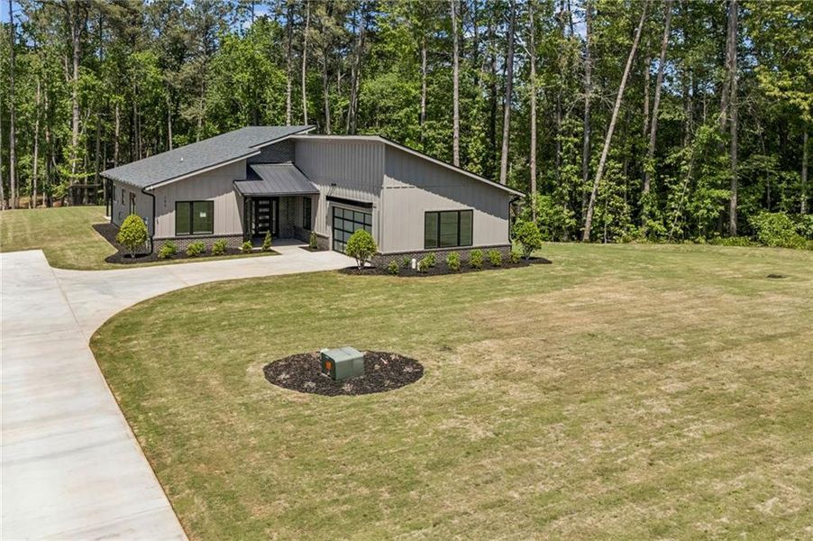 Front exterior of a new home in , Marietta, GA, highlighting curb appeal (Image 27).
