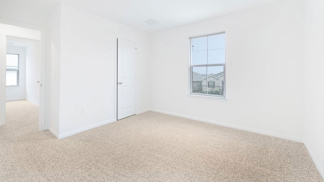 Spacious, unfurnished interior of a new home in Bar W Ranch, Leander (Image 39).
