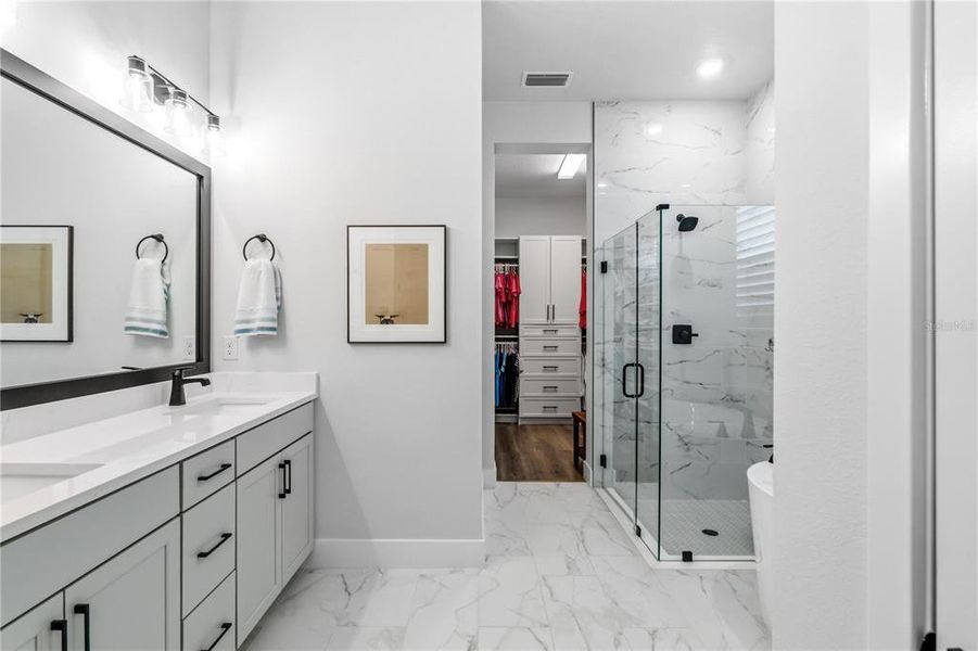 Furnished interior view inside a new home in Emerald Landing at Waterside at Lakewood Ranch – Cottage Series, Sarasota (Image 16). Furnished interior view inside a new home in Emerald Landing at Waterside at Lakewood Ranch – Cottage Series, Sarasota (Image 16).