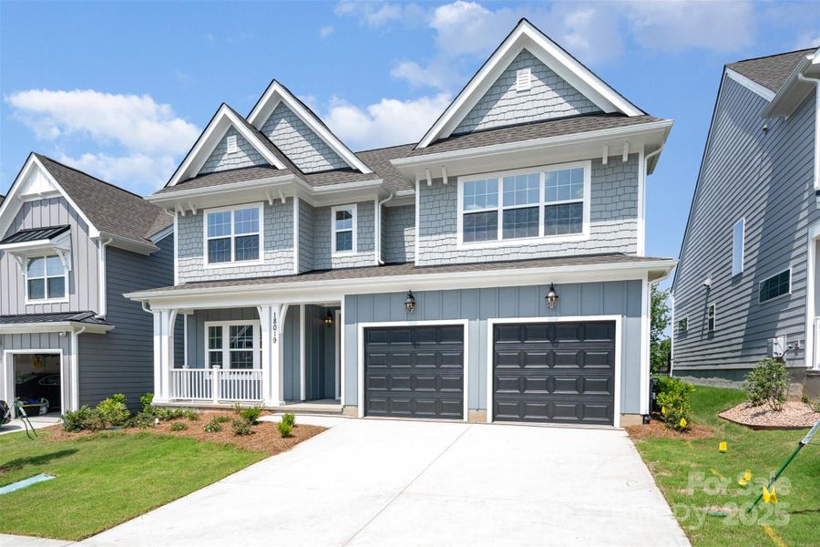 Front exterior of a new home in , Charlotte, NC, highlighting curb appeal (Image 2). Front exterior of a new home in , Charlotte, NC, highlighting curb appeal (Image 2).