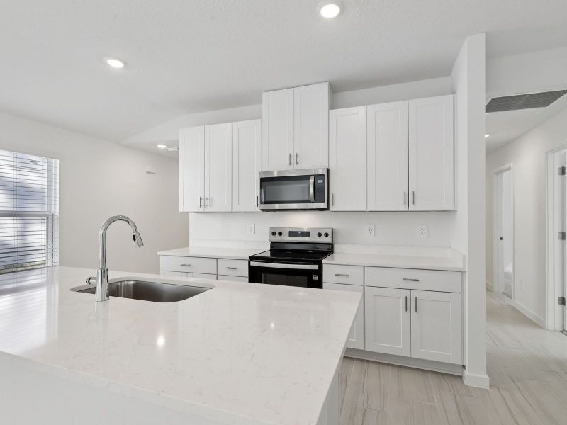 Furnished interior view inside a new home in Flagler Village - Classic Series, Palm Coast (Image 6).