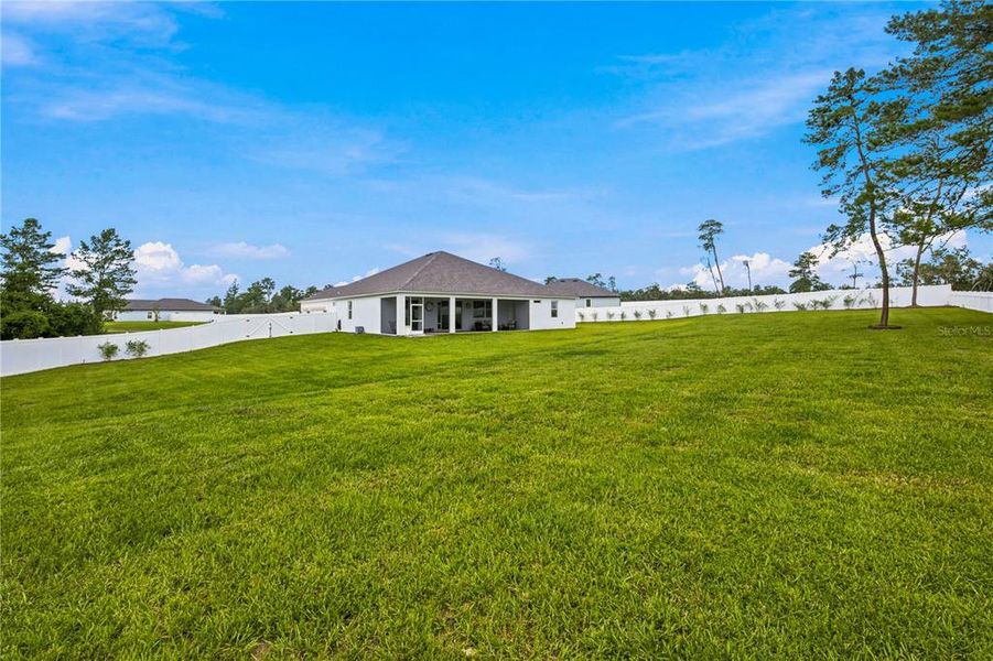 Exterior details and patio area of a home in Marion Oaks, Ocala (Image 23).