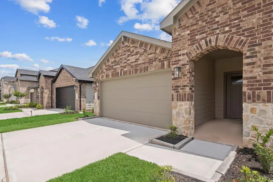 Exterior details and patio area of a home in Tamarron, Fulshear (Image 3).