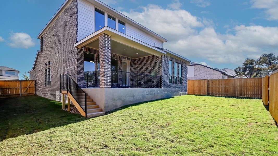 Exterior details and patio area of a home in 6 Creeks, Kyle (Image 4).