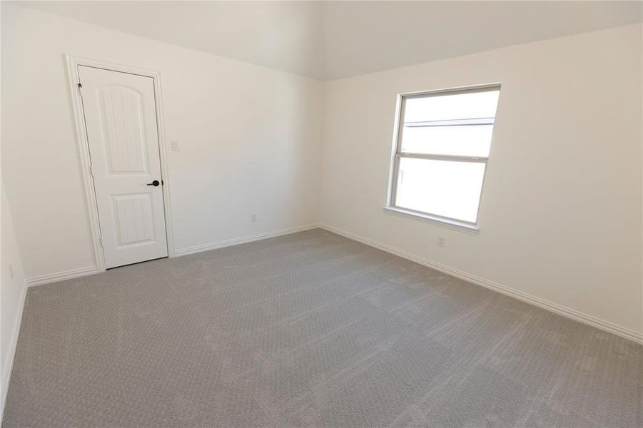 Unfurnished room featuring carpet