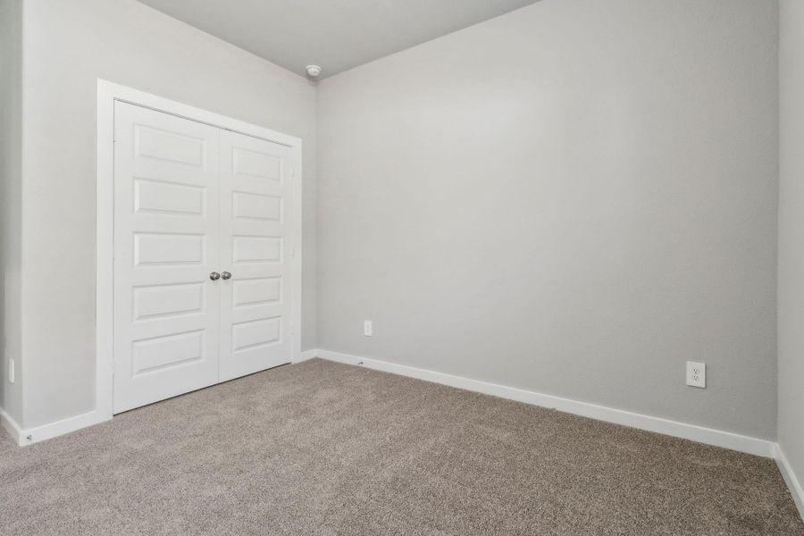 Spacious, unfurnished interior of a new home in Landing Meadows - Traditional Series, New Caney (Image 12).