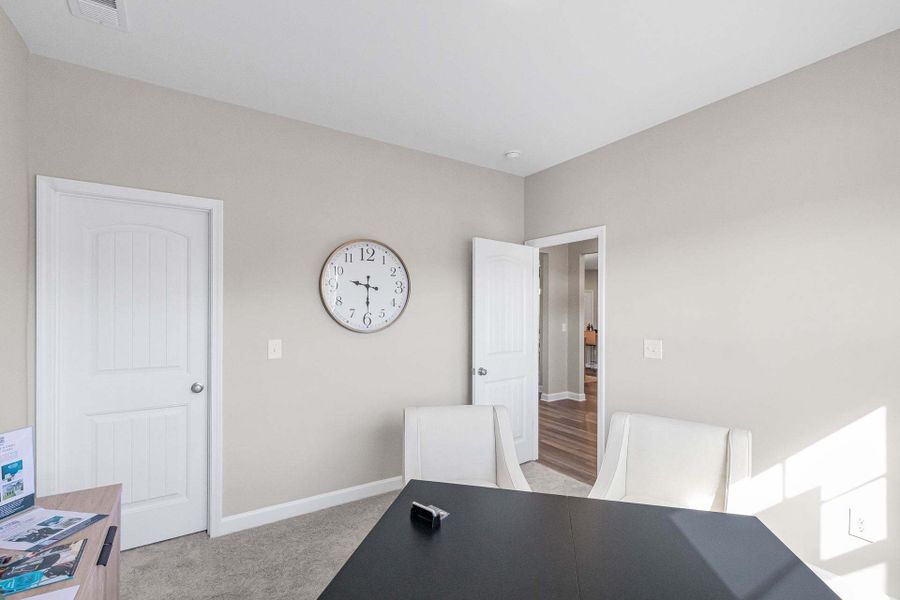 Representative furnished interior of a home built from the Aberdeen by Caviness & Cates Communities in Bartlett Manor, Youngsville (Image 107).