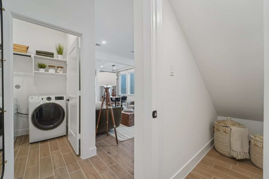 Representative furnished interior of a home built from the Versailles by Chesmar Homes in Bridgeland Chateau, Cypress (Image 5).