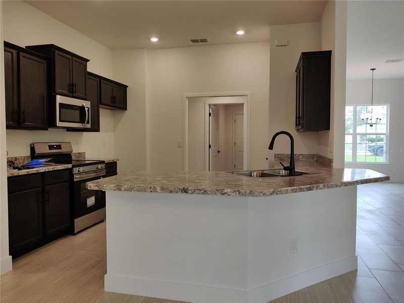 Furnished interior view inside a new home in Royal Highlands, Weeki Wachee (Image 6).