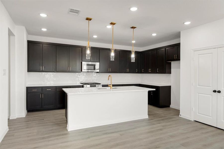 Furnished interior view inside a new home in , Forney (Image 8). Furnished interior view inside a new home in , Forney (Image 8).