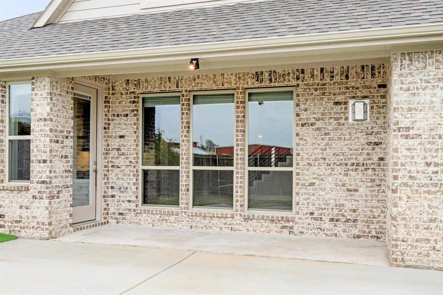 Exterior details and patio area of a home in Mockingbird Heights Classic 60, Midlothian (Image 22).