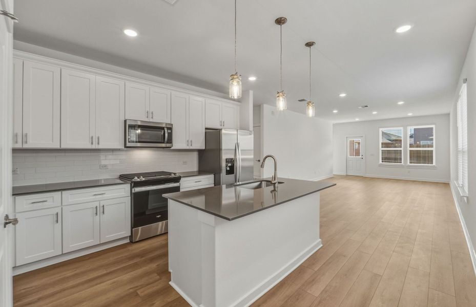 Furnished interior view inside a new home in Crosswinds, Kyle (Image 10).