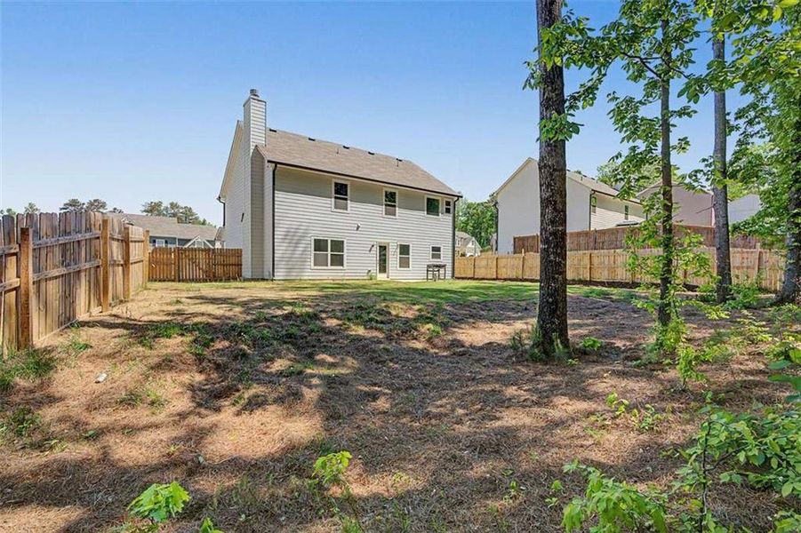 Exterior details and patio area of a home in Traditions at Cedarcrest, Dallas (Image 22).