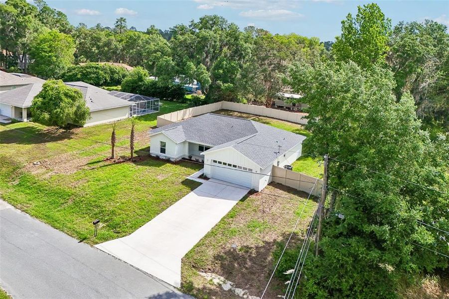 Front exterior of a new home in , Dunnellon, FL, highlighting curb appeal (Image 26).