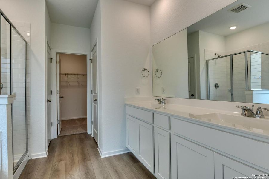 Furnished interior view inside a new home in Meadows at Hennersby Hollow 40's, San Antonio (Image 16).