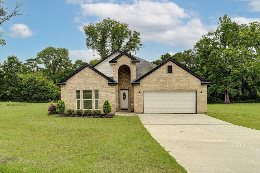 Front exterior of a new home in , Kenefick, TX, highlighting curb appeal (Image 23).