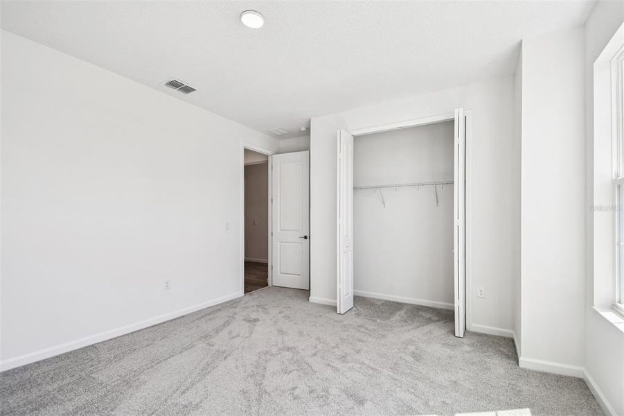 Spacious, unfurnished interior of a new home in Emerson Pointe, Apopka (Image 49).