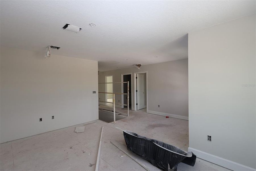 In-progress construction of a new home in Center Lake on the Park, St. Cloud, FL (Image 23).