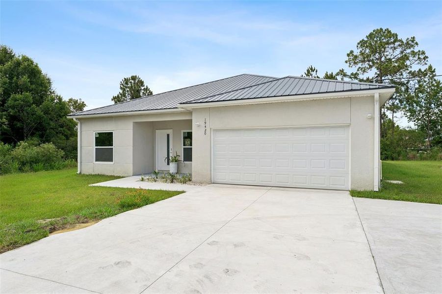 Front exterior of a new home in , Orlando, FL, highlighting curb appeal (Image 28).