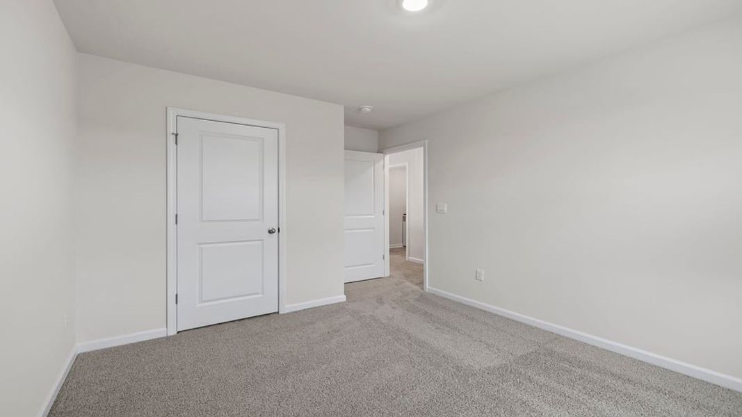 Spacious, unfurnished interior of a new home in Lakestone, Woodruff (Image 29).