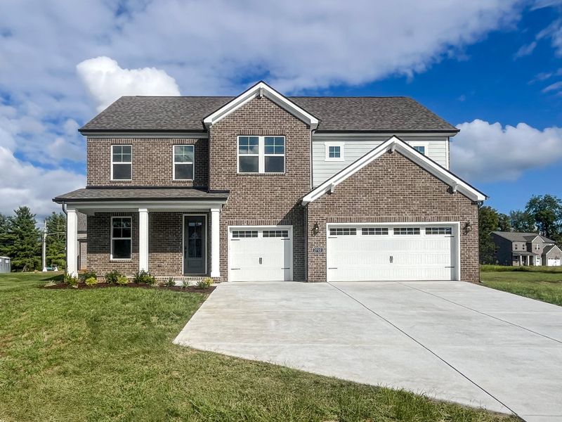 Front exterior of a new home in Slatewood, Murfreesboro, TN, highlighting curb appeal (Image 1).