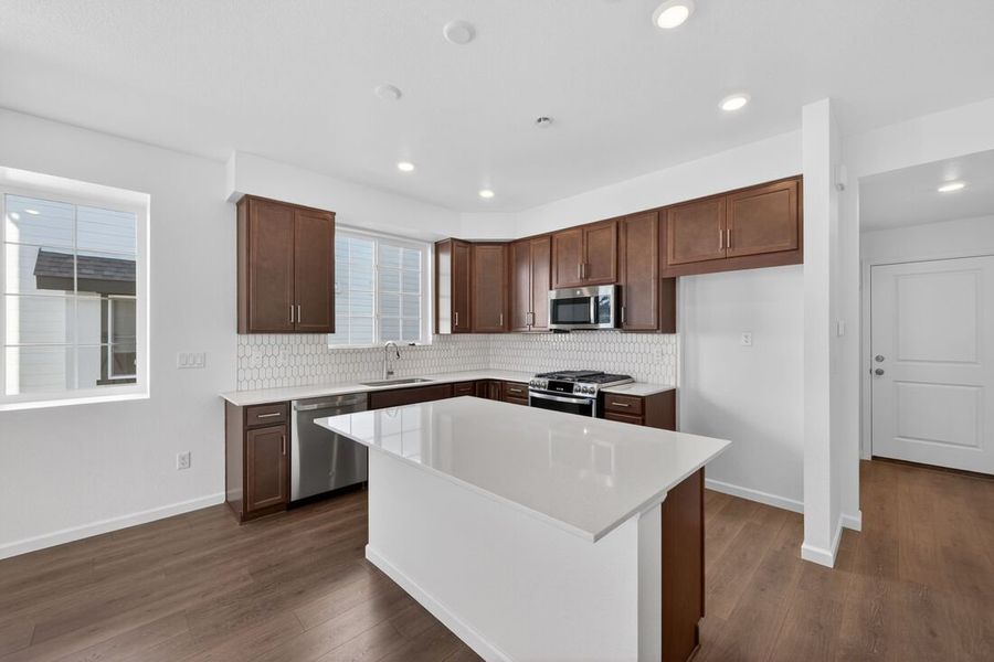 Furnished interior view inside a new home in Parterre, Thornton (Image 4).
