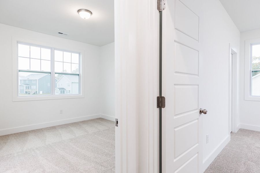 Spacious, unfurnished interior of a new home in High Grove Oaks, Fuquay Varina (Image 43).