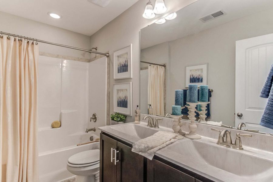 Representative furnished interior of a home built from the Drayton by Caviness & Cates Communities in Bartlett Manor, Youngsville (Image 240).