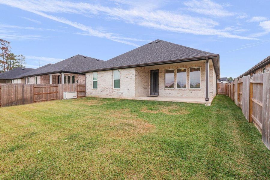 Lovely back porch, plumbed and ready for your outdoor kitchen!