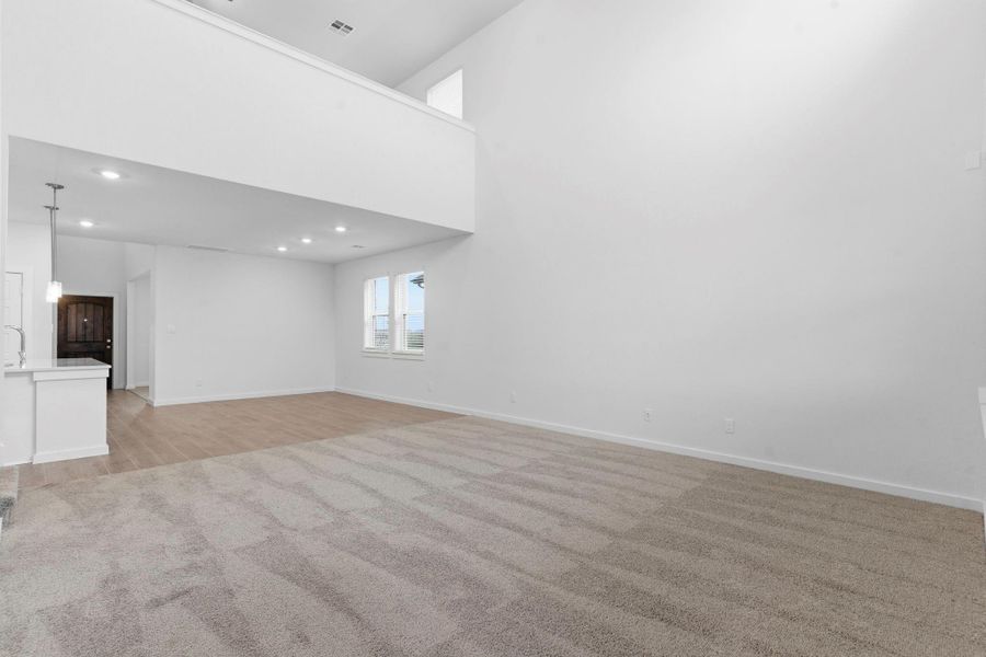 Spacious, unfurnished interior of a new home in , Iowa Colony (Image 35).