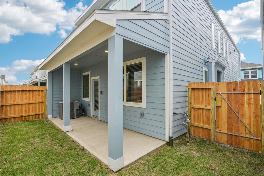 Front exterior of a new home in Kemah Crossing - City Series, Kemah, TX, highlighting curb appeal (Image 26). Front exterior of a new home in Kemah Crossing - City Series, Kemah, TX, highlighting curb appeal (Image 26).