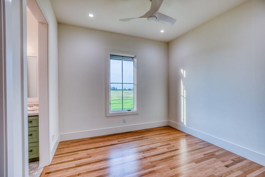 Empty room with light wood-style floors, recessed lighting, and ceiling fan Empty room with light wood-style floors, recessed lighting, and ceiling fan