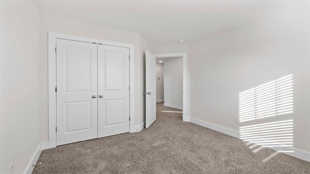 Representative unfurnished interior of a home built from the Phoenix by D.R. Horton in Edgewood Estates, Greenville (Image 21).