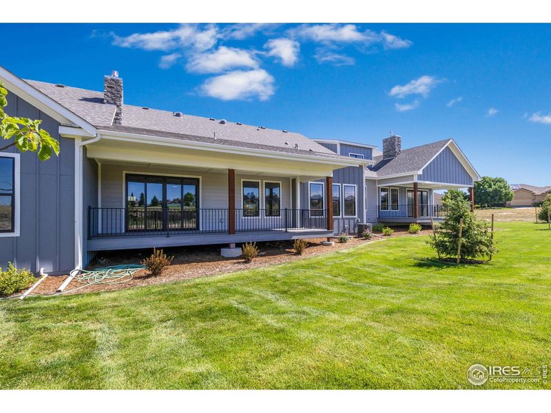 Exterior details and patio area of a home in Cottages at Kelly Farm, Greeley (Image 3).