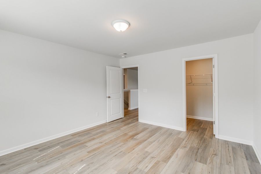 Spacious, unfurnished interior of a new home in Winston Point, Gilbert (Image 27). Spacious, unfurnished interior of a new home in Winston Point, Gilbert (Image 27).