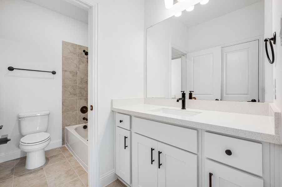 Representative furnished interior of a home built from the Sapphire by Taylor Morrison in Highland Lakes 60s, McKinney (Image 7).