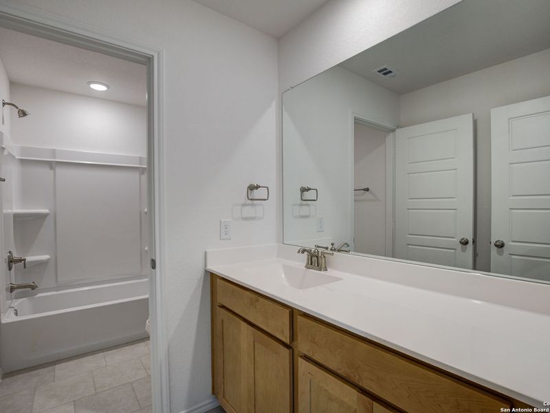 Furnished interior view inside a new home in Hannah Heights, Seguin (Image 12).