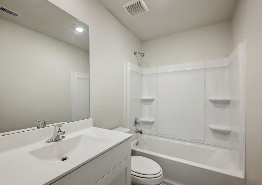 Bathroom with a shower/tub combination Bathroom with a shower/tub combination