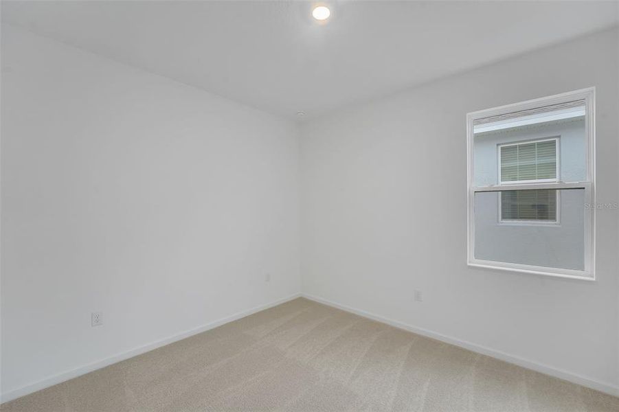 Spacious, unfurnished interior of a new home in Cypress Park Estates, Haines City (Image 27).