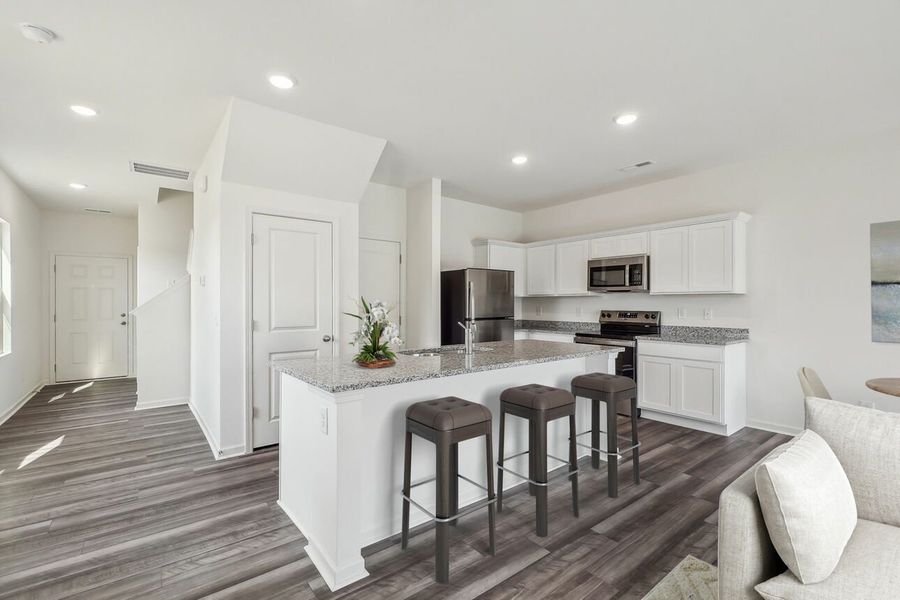 Representative furnished interior of a home built from the Dahlia by Starlight Homes in Walker Station, Wilson (Image 8).