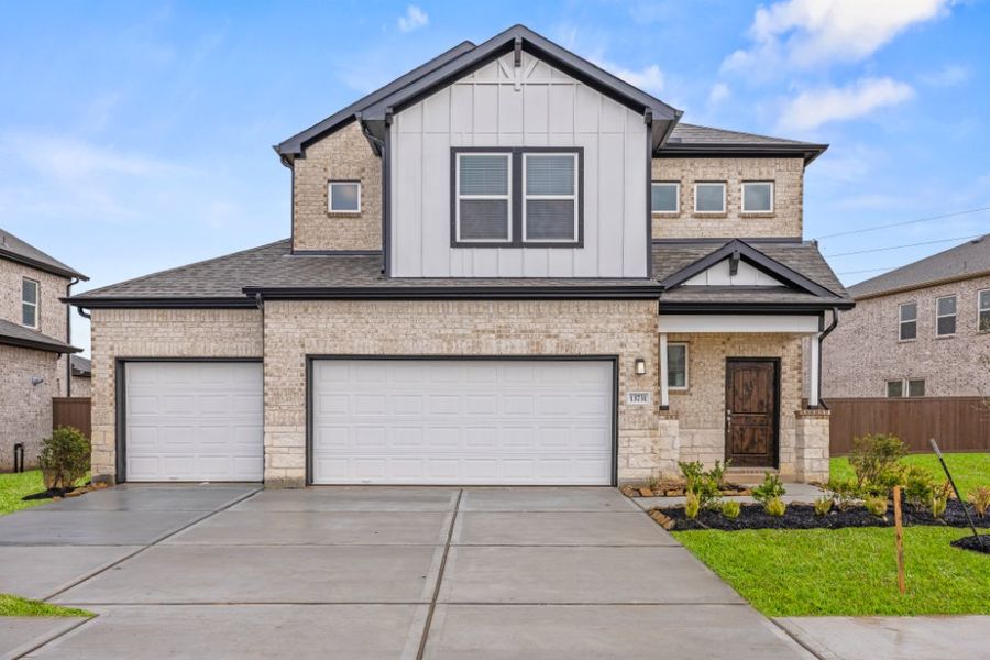 Front exterior of a new home in Creekhaven, Arcola, TX, highlighting curb appeal (Image 17).