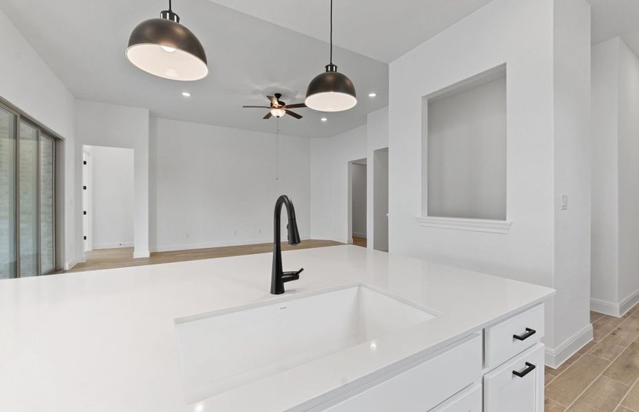 Furnished interior view inside a new home in Bluffview Reserve, Leander (Image 9).