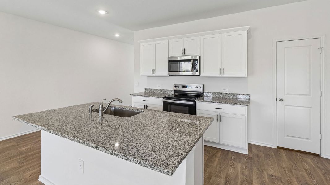 Furnished interior view inside a new home in Palomino, Manor (Image 9).