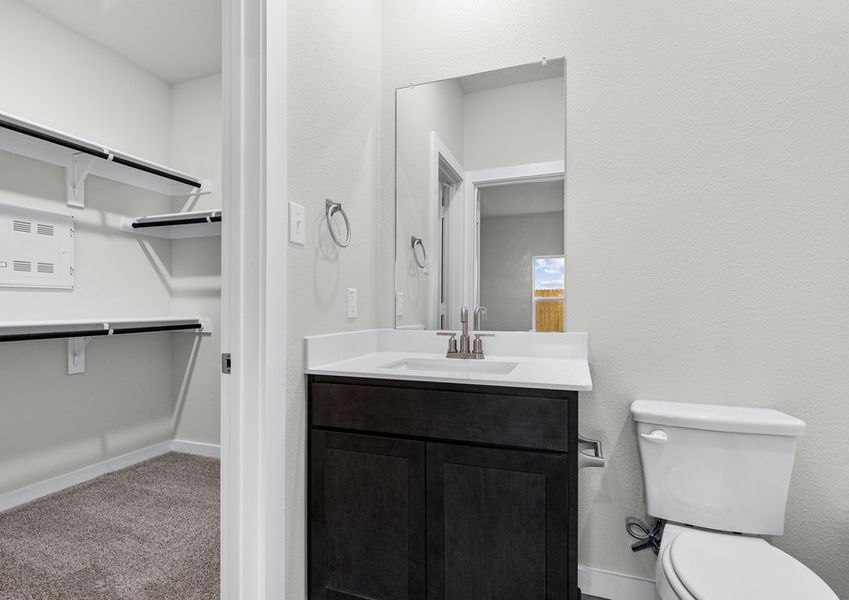 The master walk-in closet is located off of the bathroom. The master walk-in closet is located off of the bathroom.