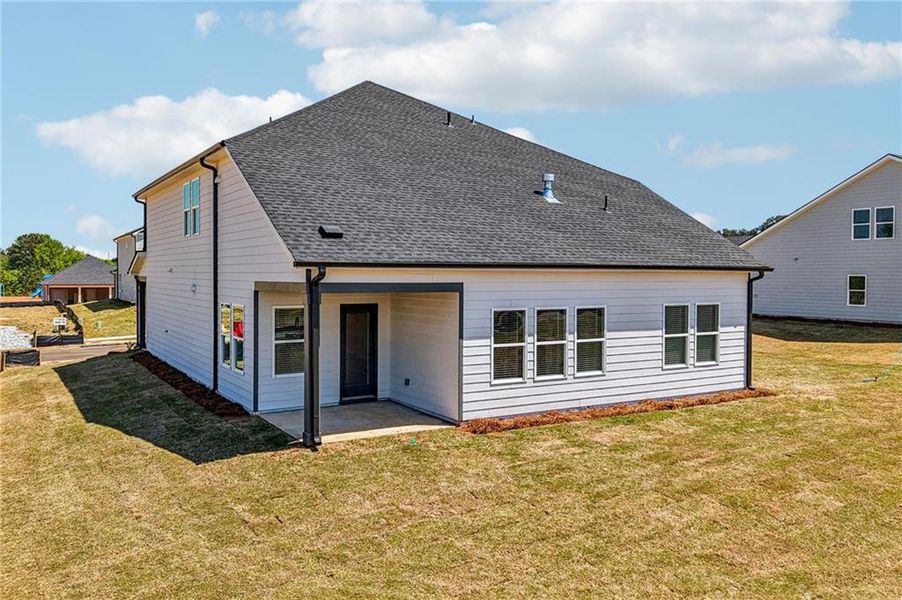 Exterior details and patio area of a home in River Pointe, Monroe (Image 3).