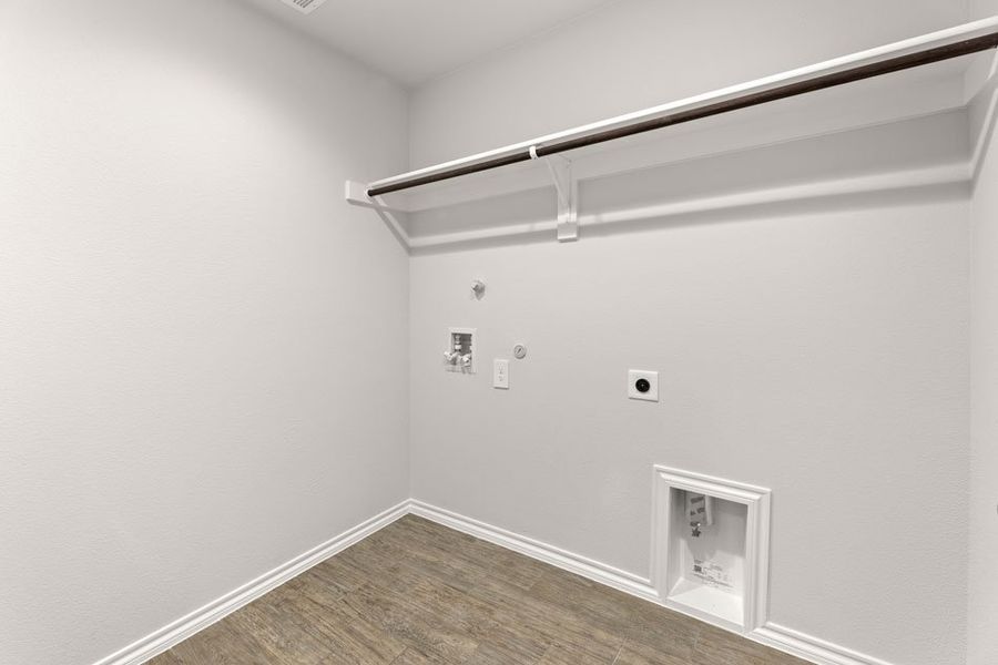 Representative exterior photo of a completed home built from the Lincoln by Impression Homes in ValleyBrooke, Mesquite, TX (Image 23).