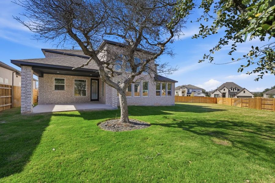 Exterior details and patio area of a home in Parkside on the River, Georgetown (Image 18).